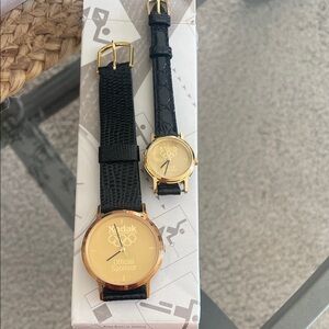 Gold and Black Olympic Watches